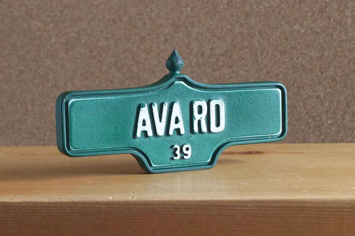 3/4 view of Ava Rd #39 Magnet - Weathered Finish, miniature replica Toronto Forest Hill acorn street sign