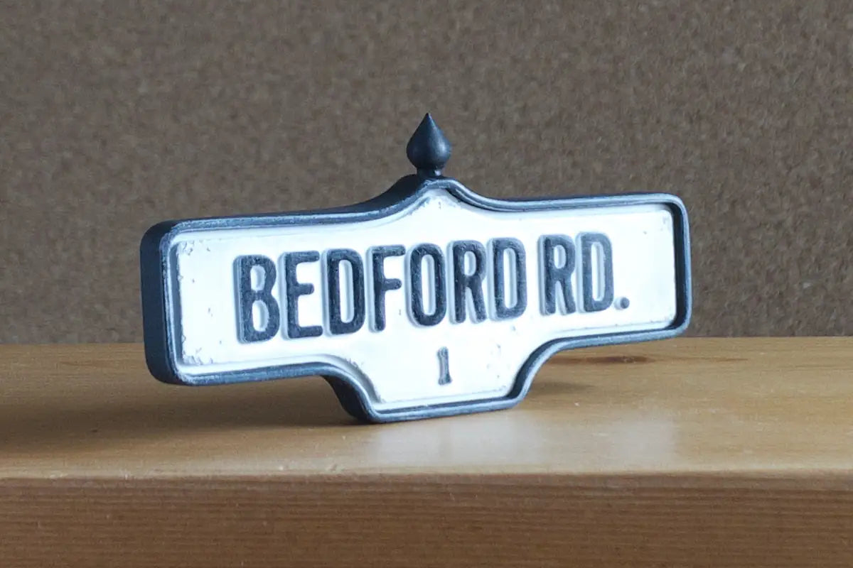 3/4 view of Bedford Rd. #1 - Weathered Finish, miniature replica Toronto acorn street sign