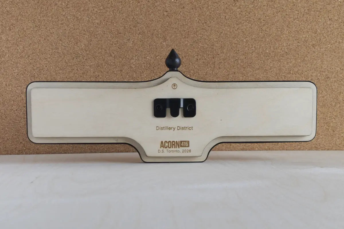 Back view of Distillery District Wall Sign - Natural Finish, wall-mounted replica Toronto acorn neighbourhood sign