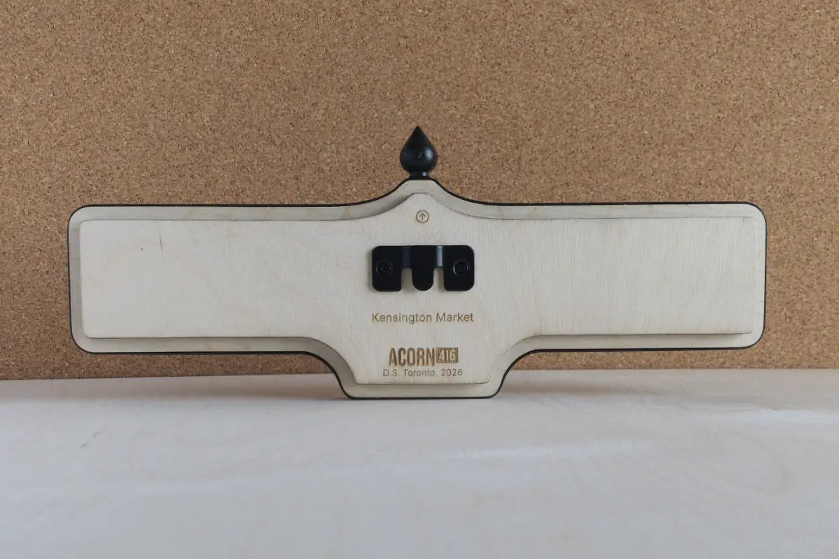 Back view of Kensington Market Wall Sign - Natural Finish, wall-mounted replica Toronto acorn neighbourhood sign