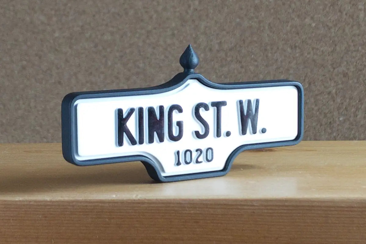 3/4 view of King St. W. #1020 - Standard Finish, miniature replica Toronto acorn street sign