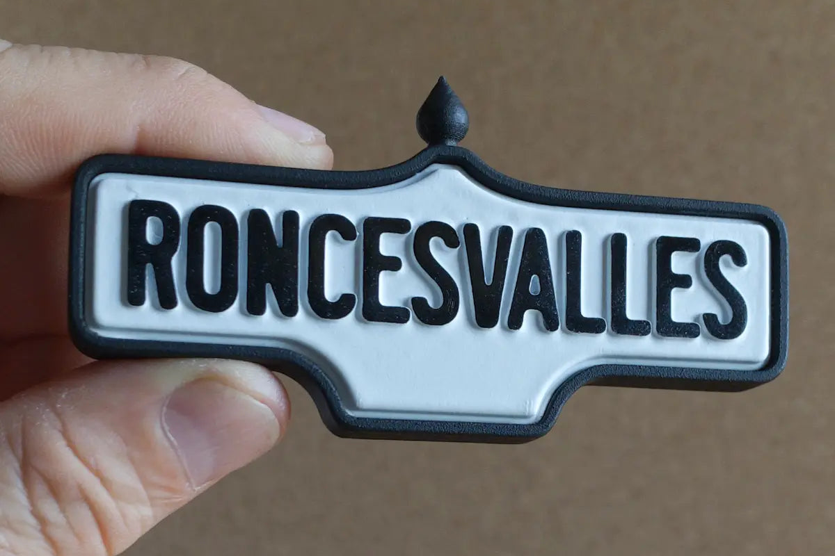 In-hand view of Roncesvalles 2-Pack - Standard Finish, miniature replica Toronto neighbourhood acorn street sign