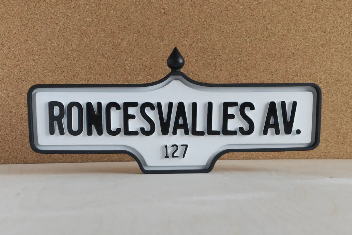 Front view of Roncesvalles Av. #127 Wall Sign - Standard Finish, wall-mounted replica Toronto acorn street sign