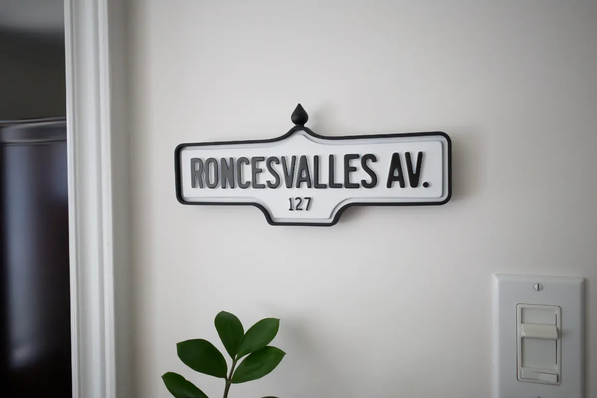 On-wall view of Roncesvalles Av. #127 Wall Sign - Standard Finish, wall-mounted replica Toronto acorn street sign