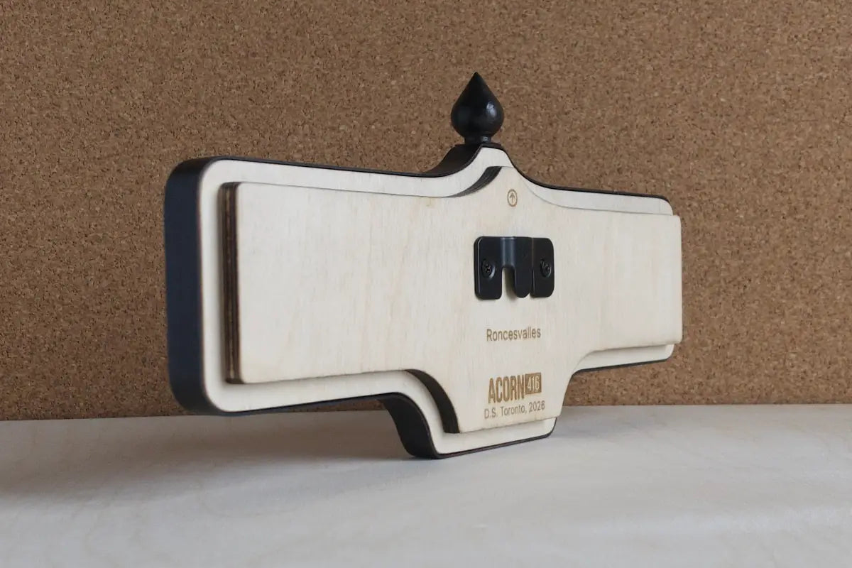 Angled back view of Roncesvalles Wall Sign - Natural Finish, wall-mounted replica Toronto acorn neighbourhood sign