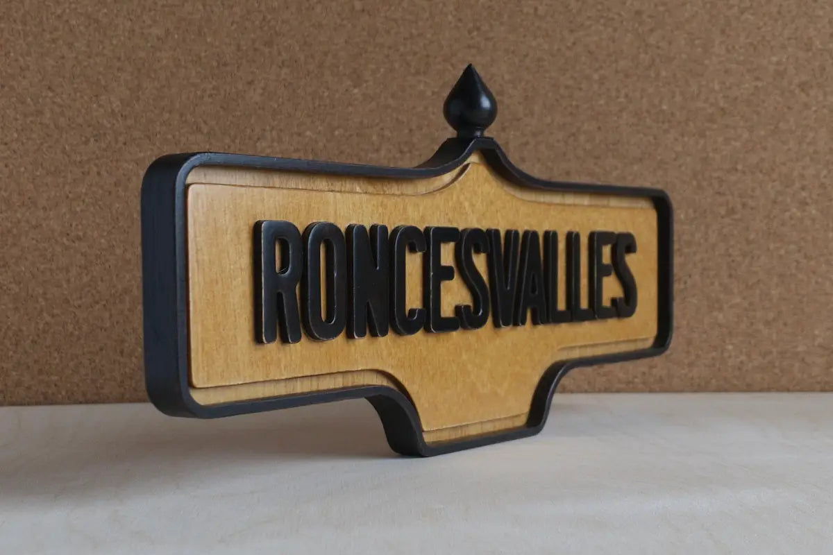 Angled front view of Roncesvalles Wall Sign - Natural Finish, wall-mounted replica Toronto acorn neighbourhood sign