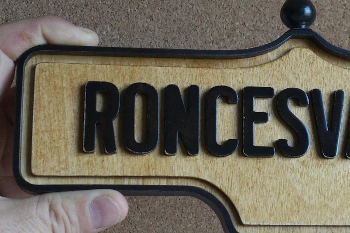 In-hand view of Roncesvalles Wall Sign - Natural Finish, wall-mounted replica Toronto acorn neighbourhood sign
