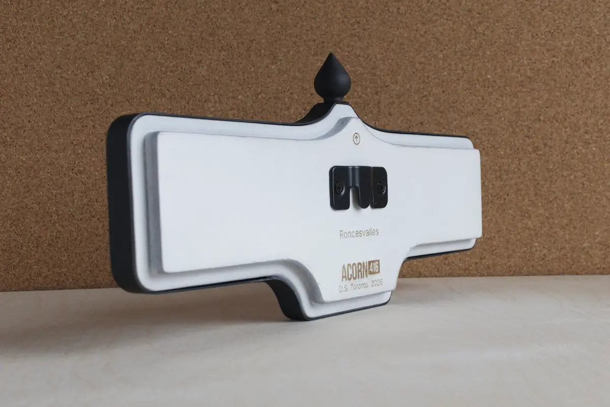 Angled back view of Roncesvalles Wall Sign - Standard Finish, wall-mounted replica Toronto acorn neighbourhood sign
