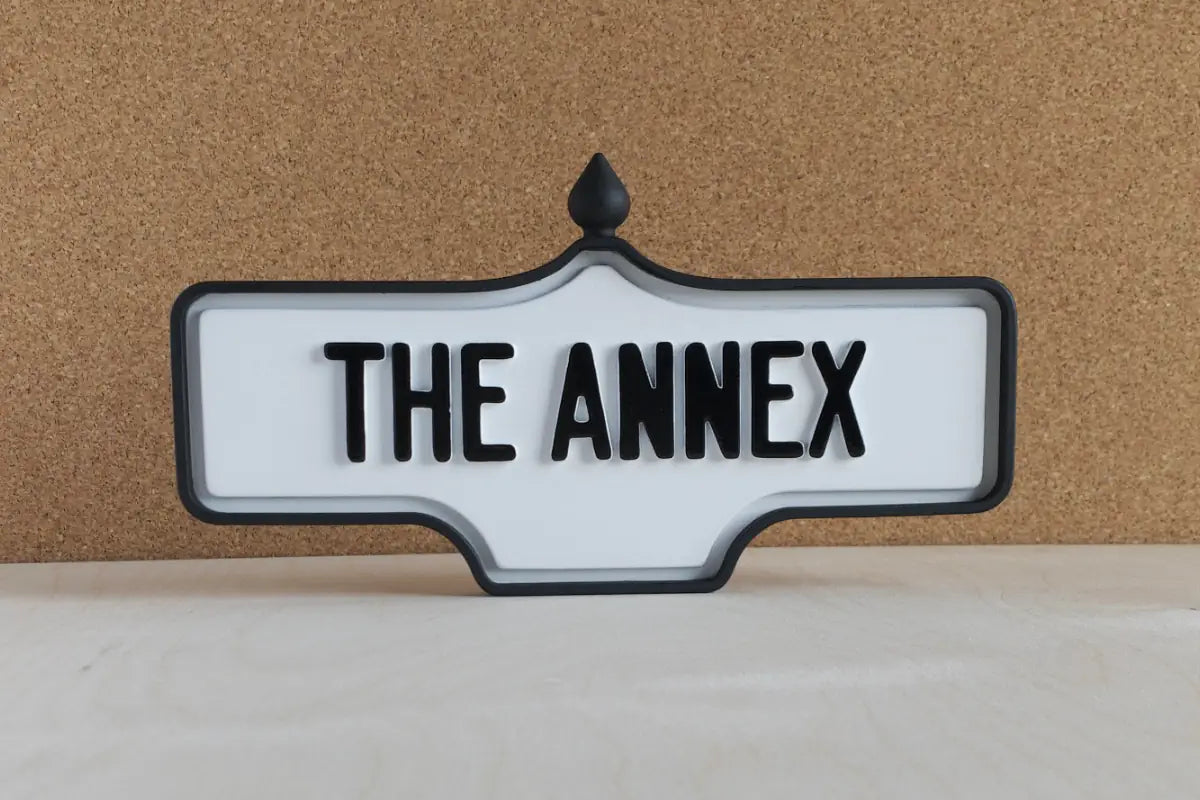 Front view of The Annex Wall Sign - Standard Finish, wall-mounted replica Toronto acorn neighbourhood sign