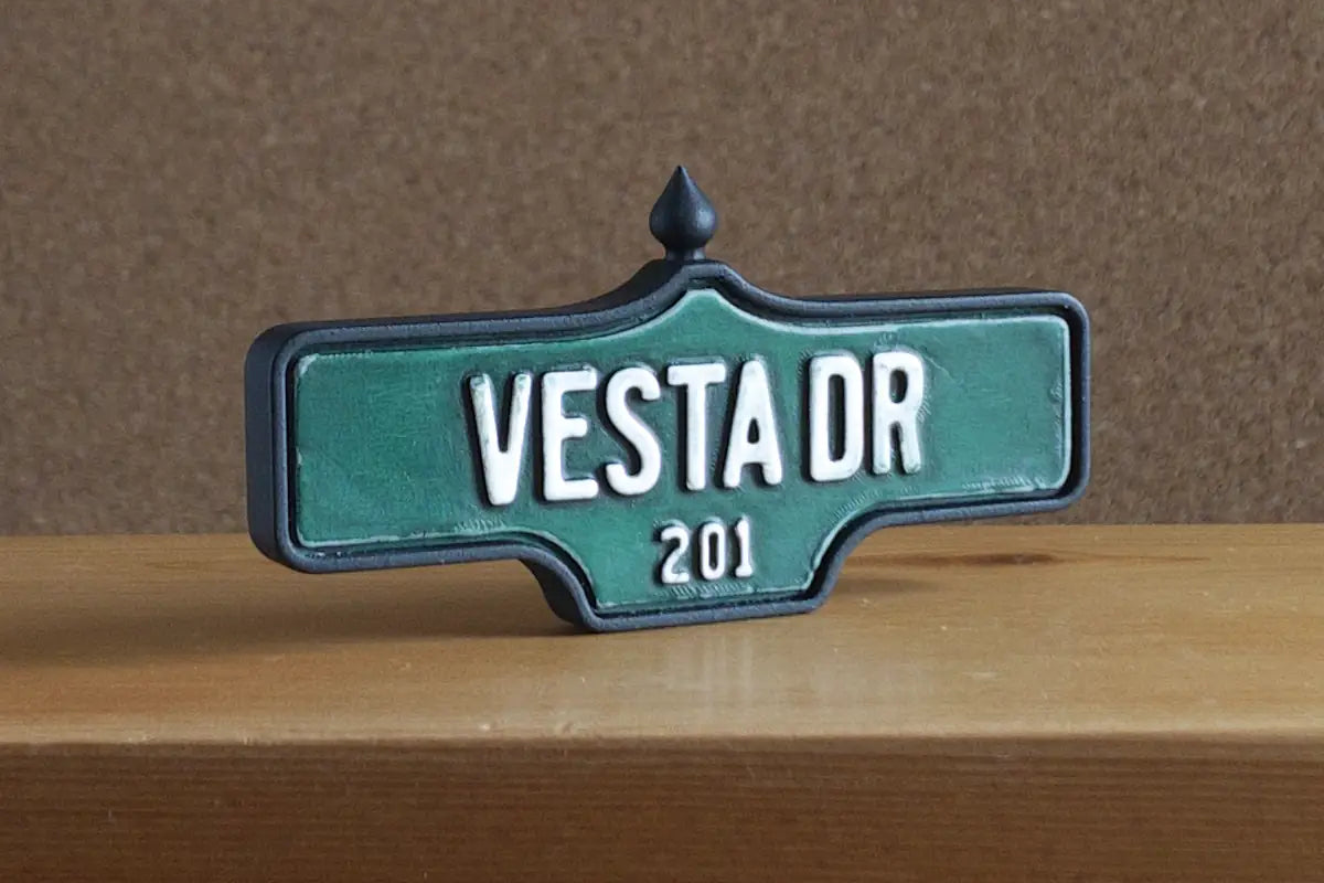 3/4 view of Vesta Dr #201 Magnet - Weathered Finish, miniature replica Toronto Forest Hill acorn street sign